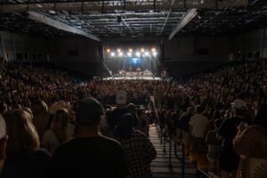 The Sonnentag event center set up for a concert, showcasing its 5,000-seat arena designed for both entertainment and collegiate sports events