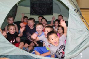 MVCC KidRec participants play in a tent
