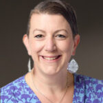 Professional headshot of Eve Esch