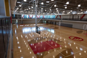 Basketball courts reset inside Jacksonville State University recreation center after Red Tie Gala event