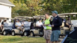 Chris Stewart speaking to participants before the Cleveland State Rec golf scramble begins
