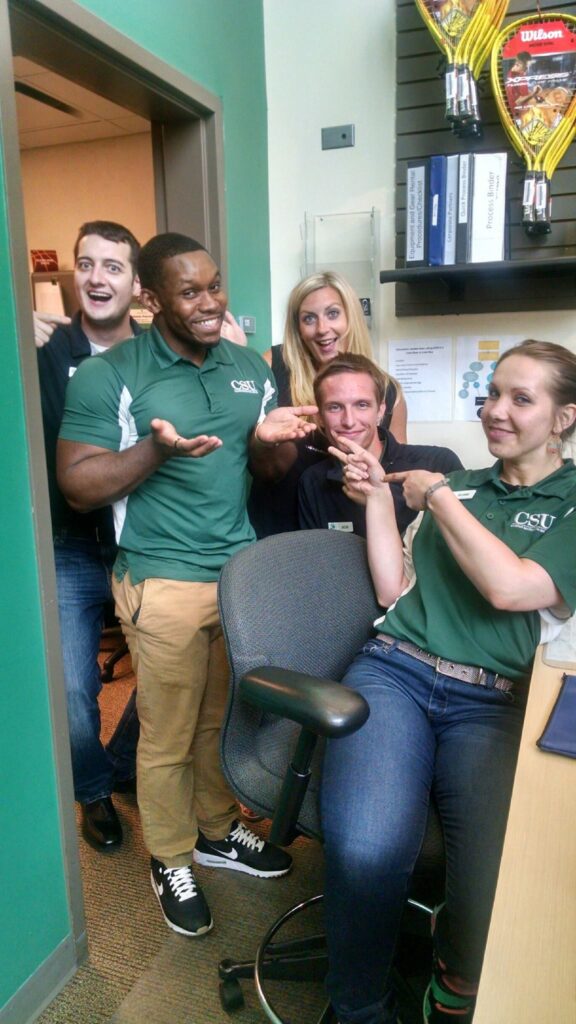 CSU student employees laughing together while building teamwork and leadership skills through student jobs at CENTERS
